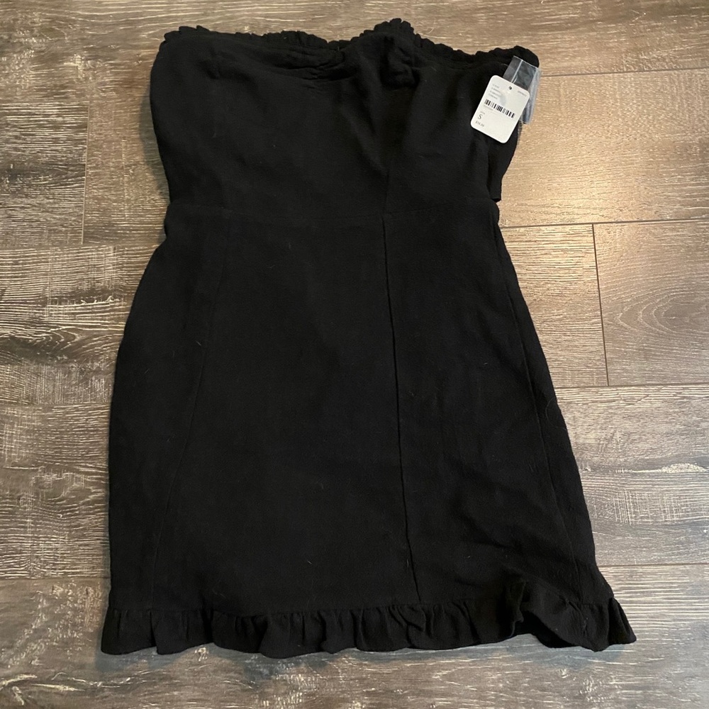 Black strapless free people dress.